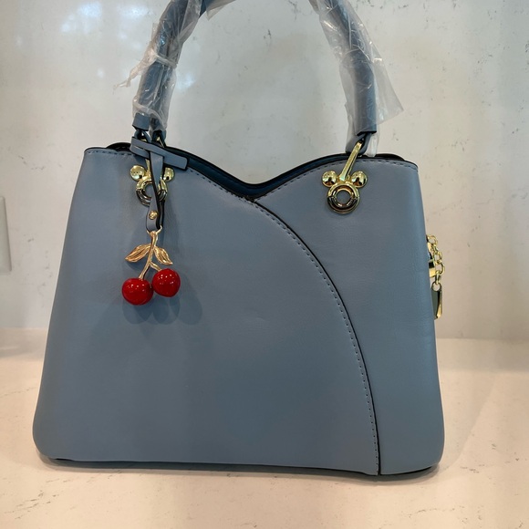Elegant Blue Handbag with Cherry Charm - Picture 2 of 6